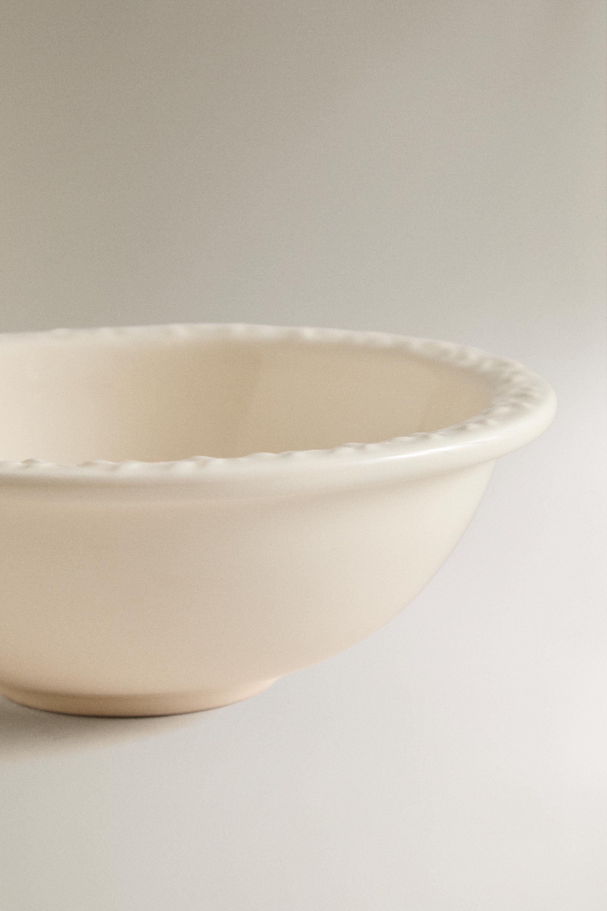 EARTHENWARE BOWL WITH RAISED RIM